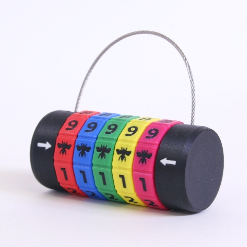 A custom-made padlock with multicoloured dials. Each dial contains the digits 0-9 and the image of a bee!