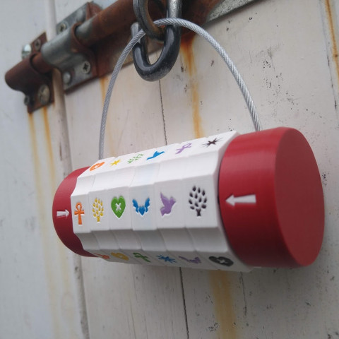A custom-made padlock with white dials and multi-coloured symbols.