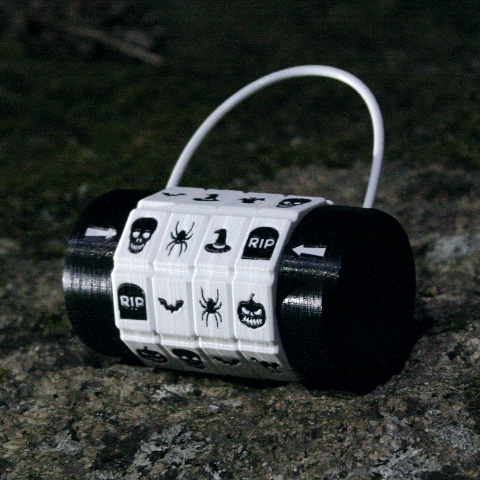 A custom-made padlock with spooky symbols sitting on a moonlit lichen-covered rock.